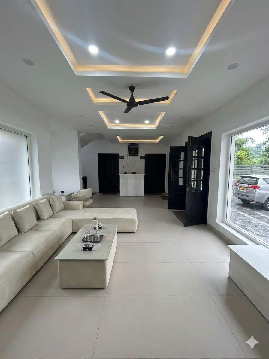 Light-filled lounge with sofas and large windows