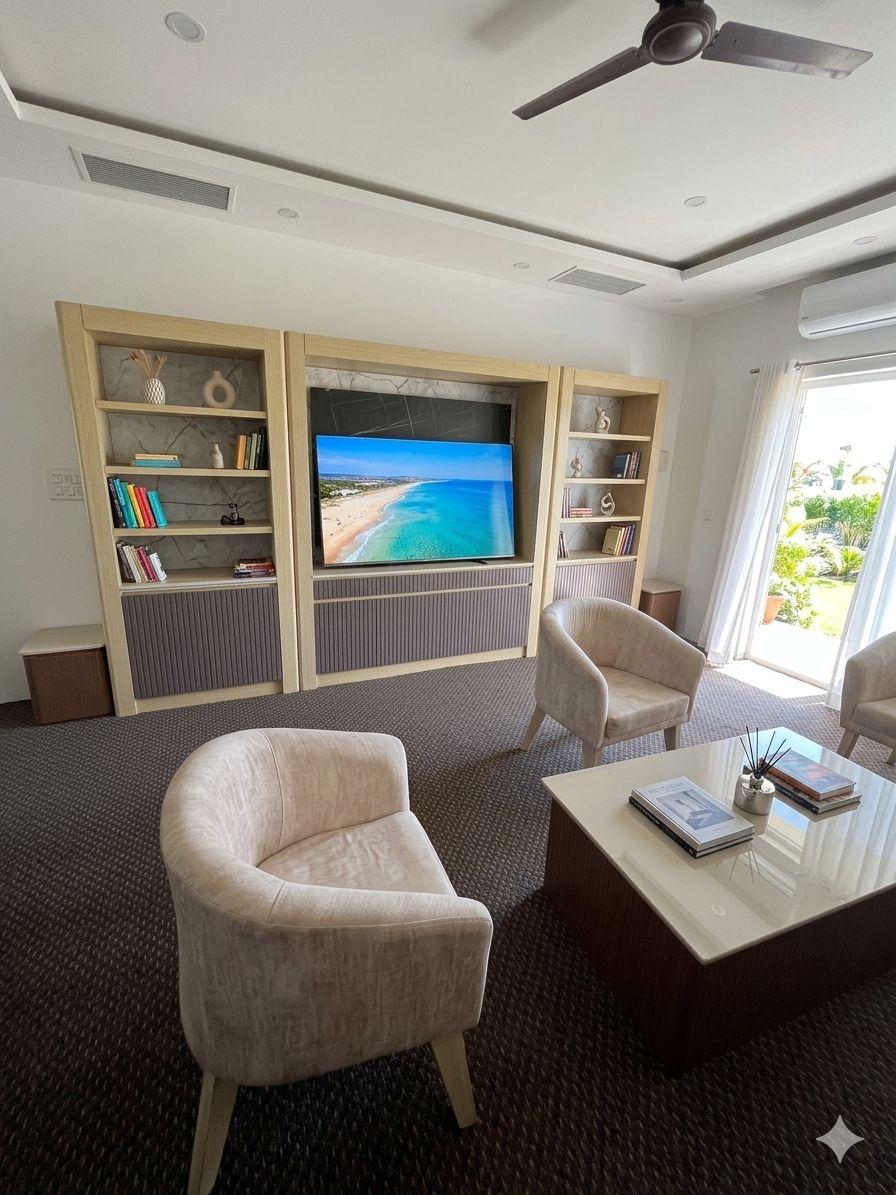 Reading lounge with bookshelves and comfortable chairs